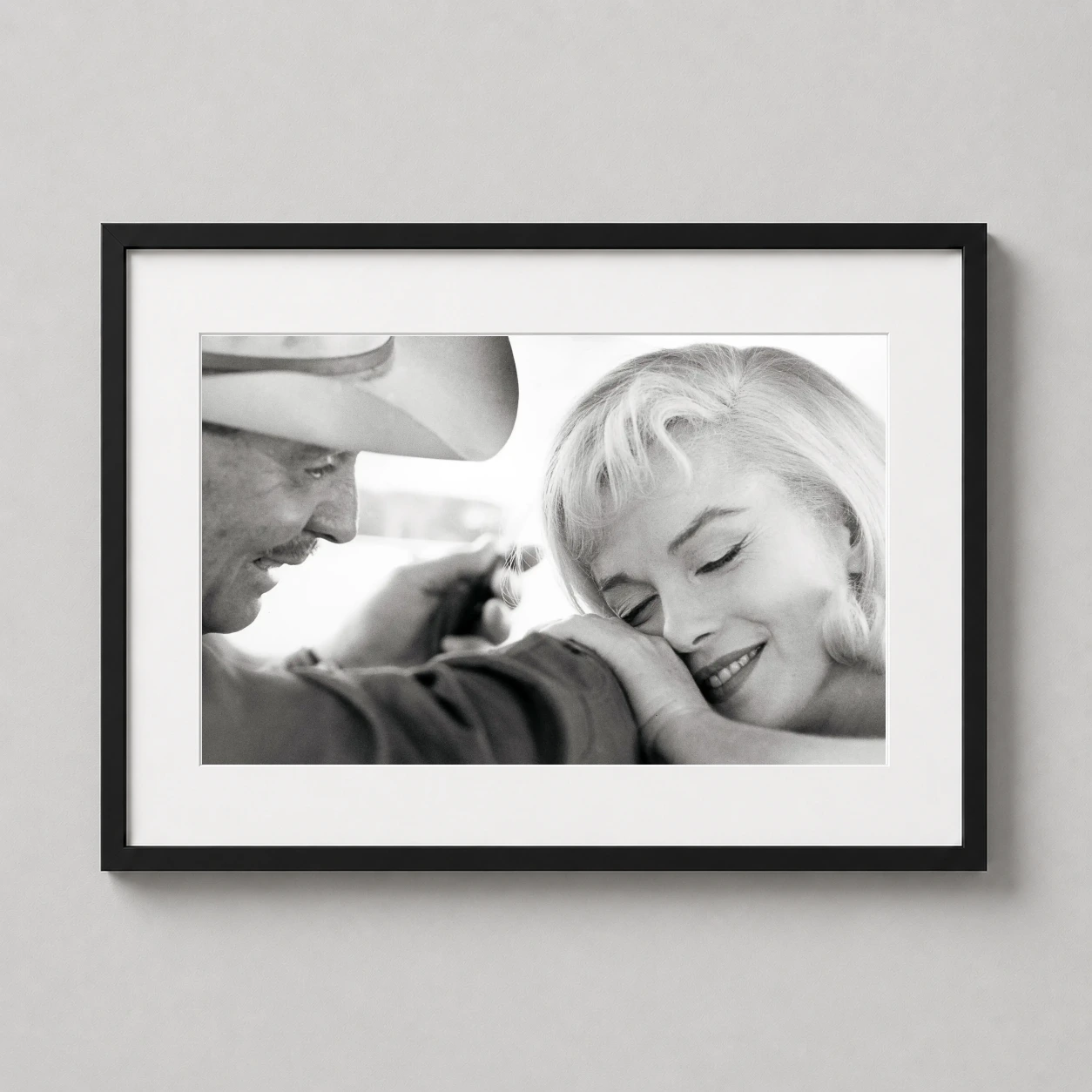 Marilyn Monroe Clark Gable — candid black and white photograph of Marilyn Monroe and Clark Gable