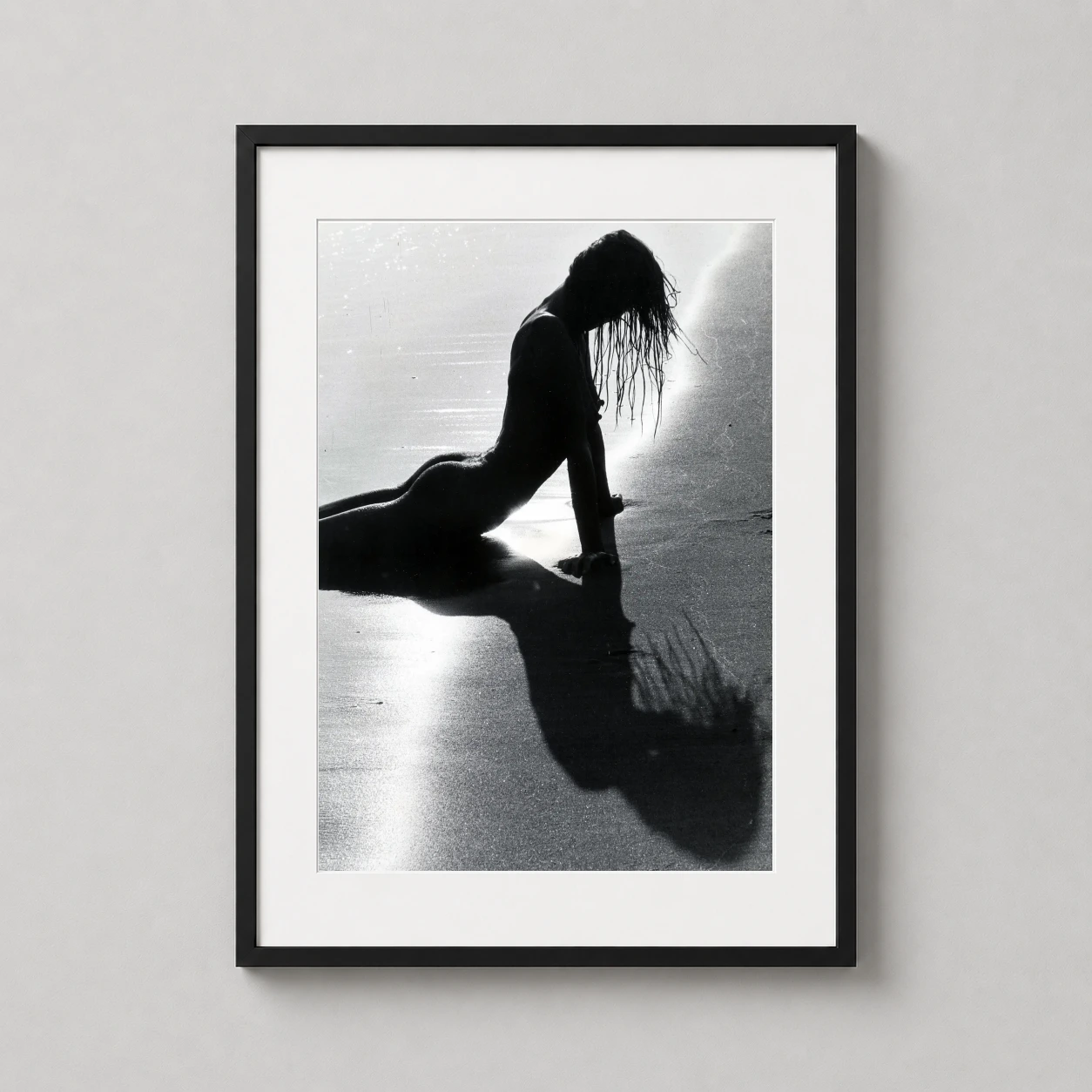 Lucien Clergue Nu Beach Photo — dramatic black and white photograph by Lucien Clergue featuring a nude