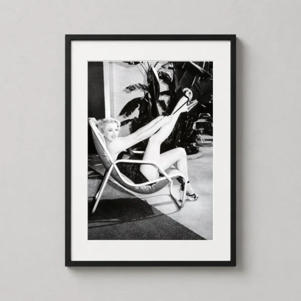 Marilyn Monroe Lounging in Patio Chair Black and White Photography Print