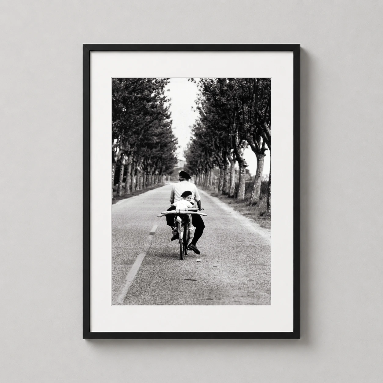 Elliott Erwitt Provence 1955 — charming black and white street photography print featuring a man and