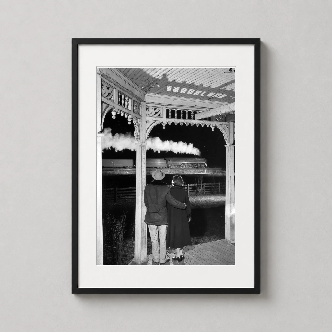Popes Last Steam Train O Winston Link — black and white photograph of a couple on a Victorian porch watching a