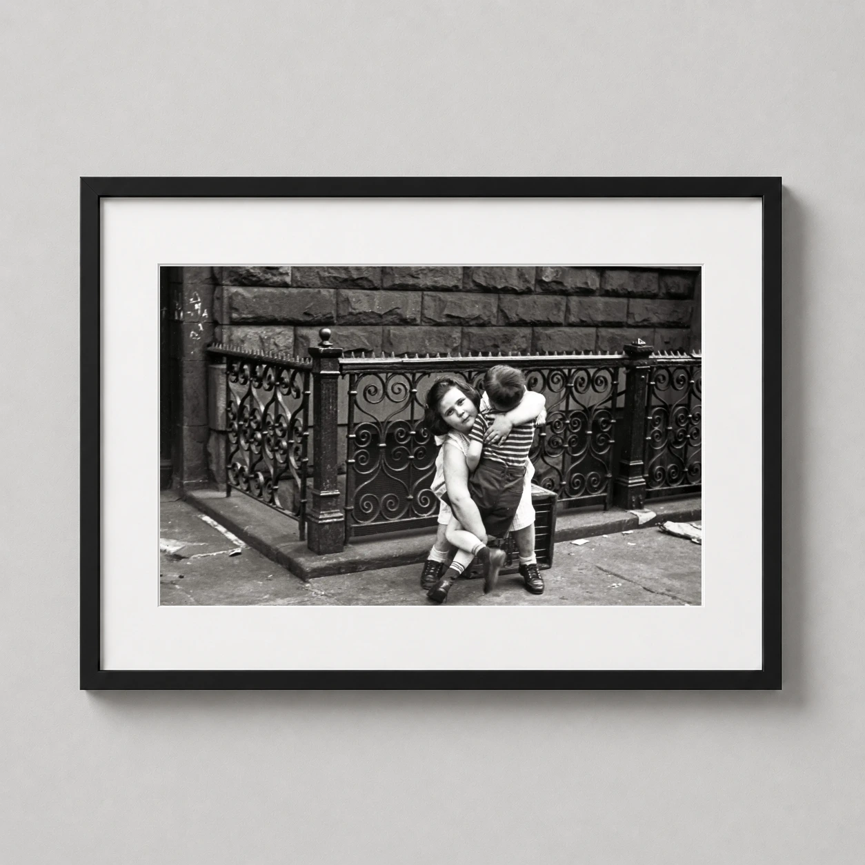 Helen Levitt Children Hugging — candid black and white 1940s street photograph by Helen Levitt