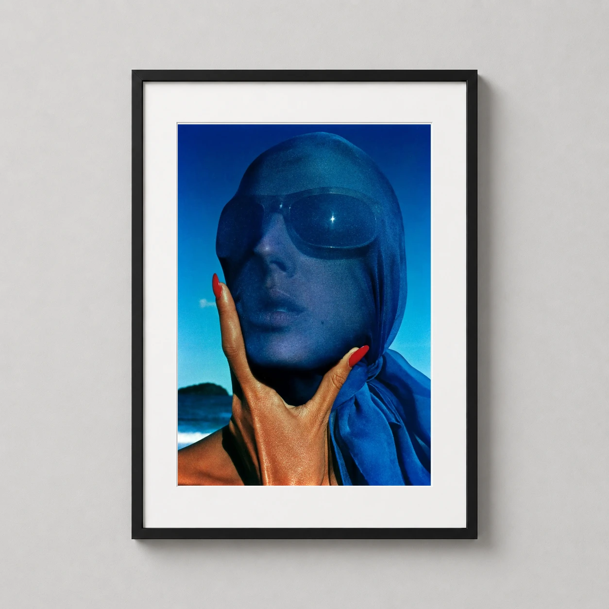 Hiro Tilly Tizzani Scarf — featuring Tilly Tizzani draped in a vibrant cobalt blue scarf and