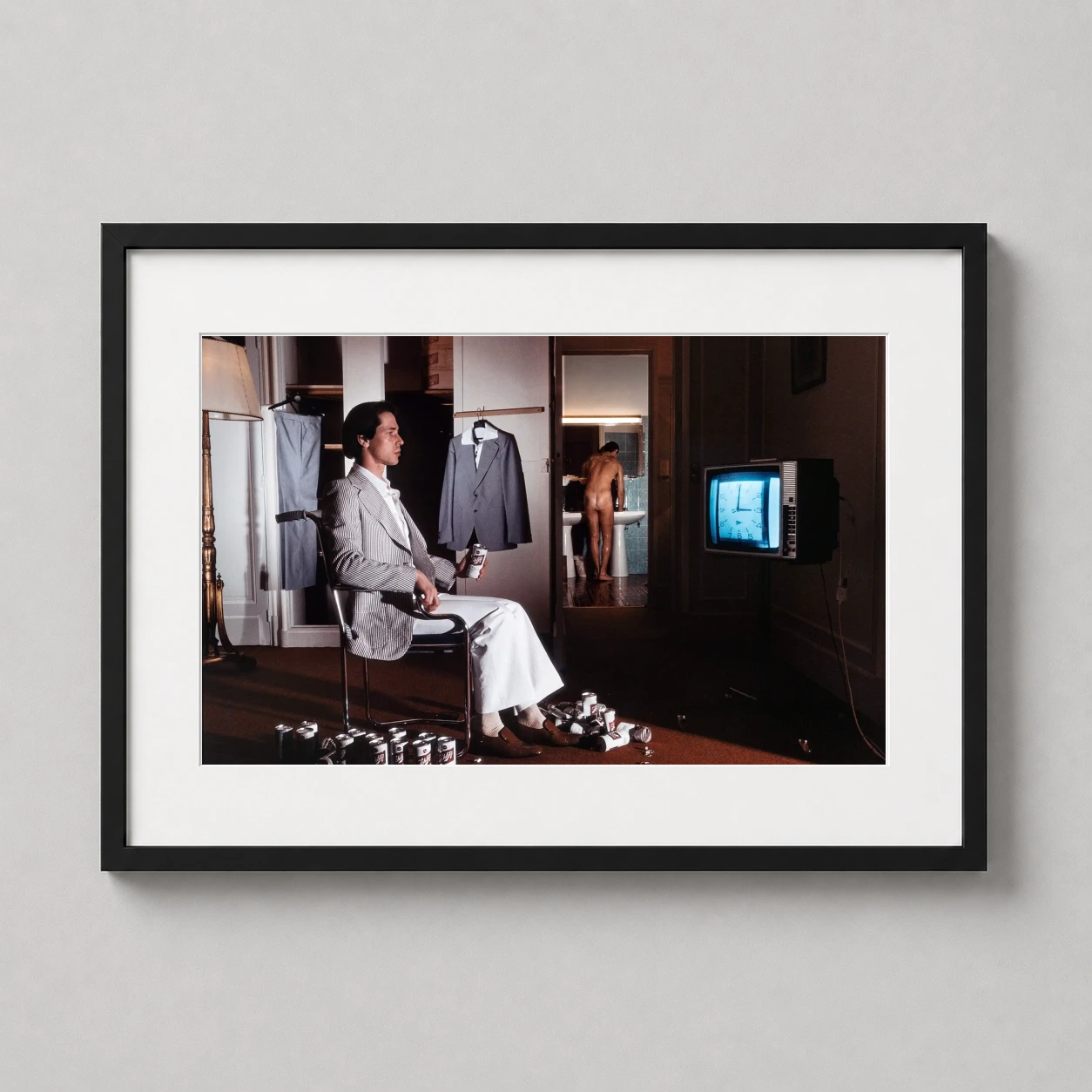 Ted Lapidus Vogue Hommes — cinematic 1977 fashion photograph by Guy Bourdin featuring a seated man