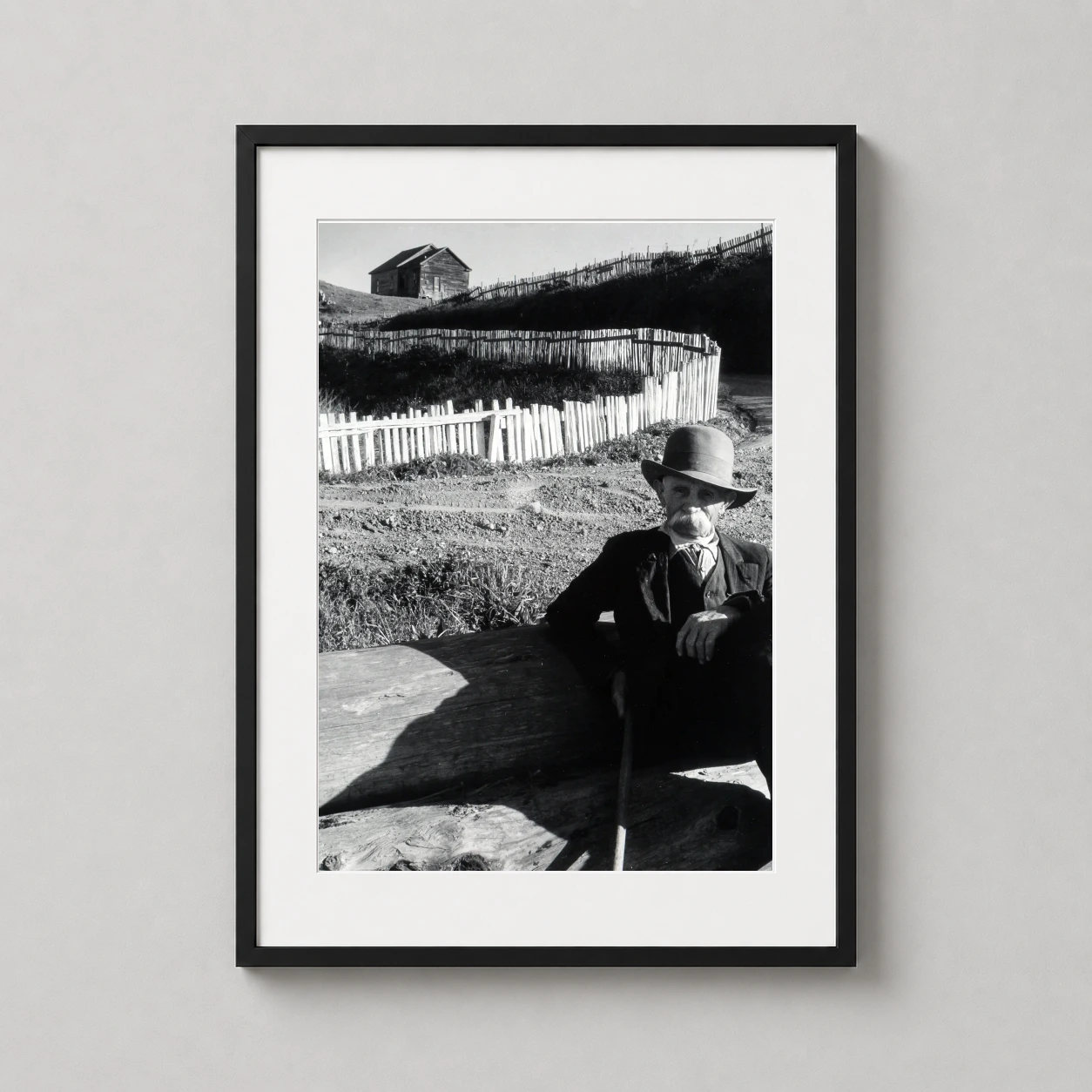 Imogen Cunningham — stark black and white portrait of an elderly man in a bowler hat by