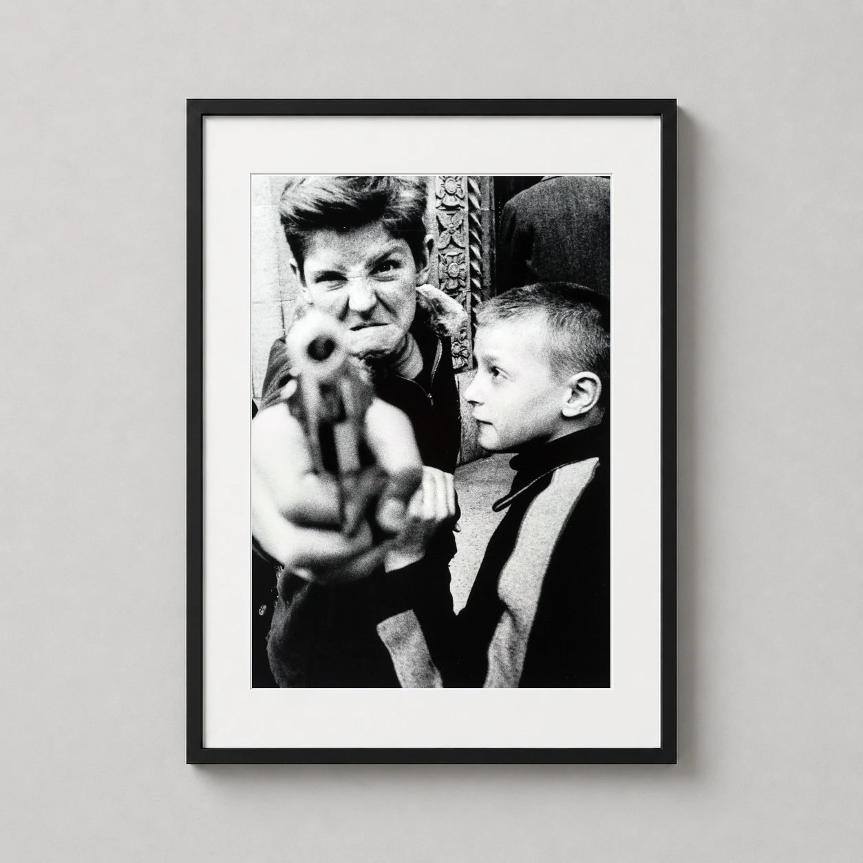 William Klein Gun 1 — gritty black and white photograph featuring a boy in 1955 New York