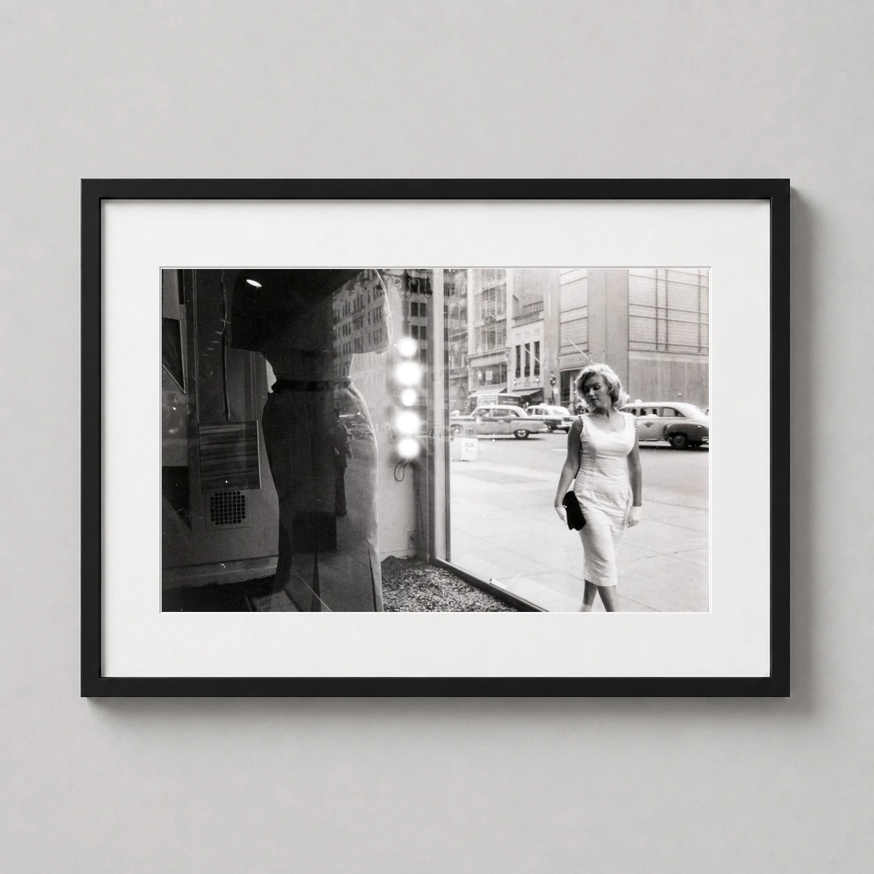 Sam Shaw — candid black and white photograph by Sam Shaw featuring Marilyn Monroe