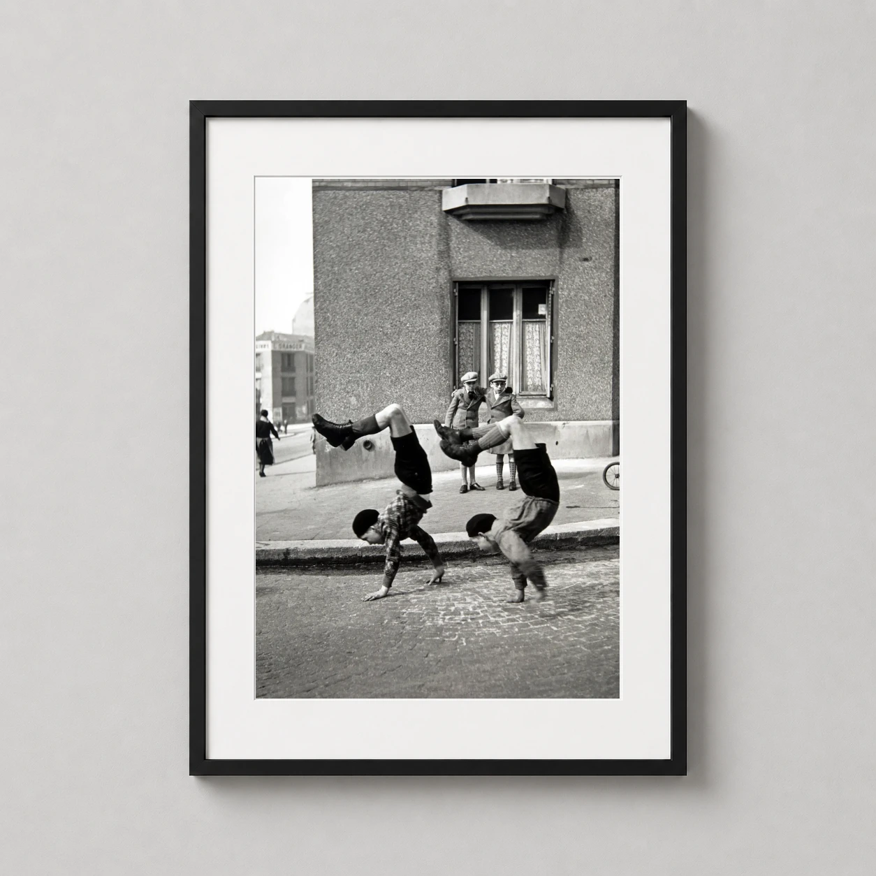 Robert Doisneau les Frères — black and white vintage photograph by Robert Doisneau featuring two