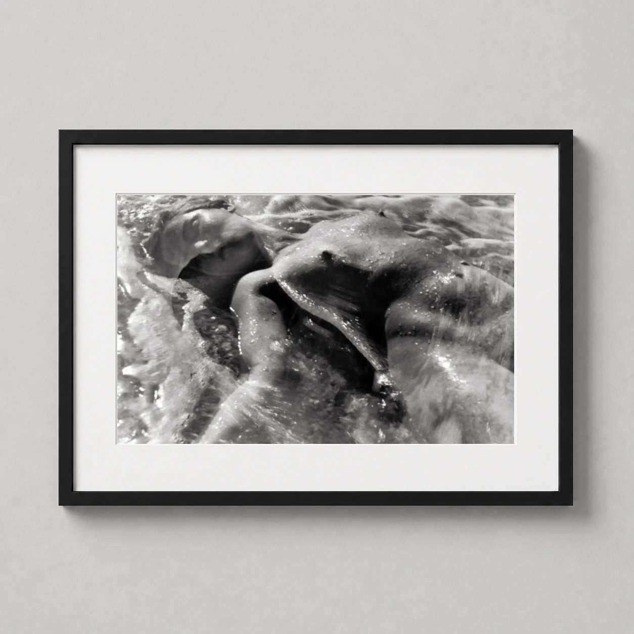 Ruth Bernhard Waves 1945 — sculptural female form merges with the frothing saltwater in Ruth