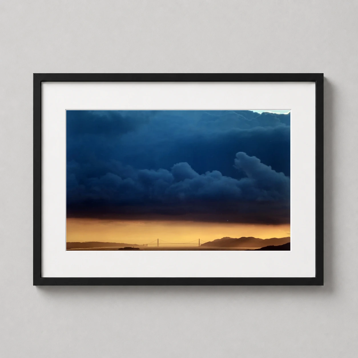 Richard Misrach — dramatic California seascape featuring dark blue storm clouds above a