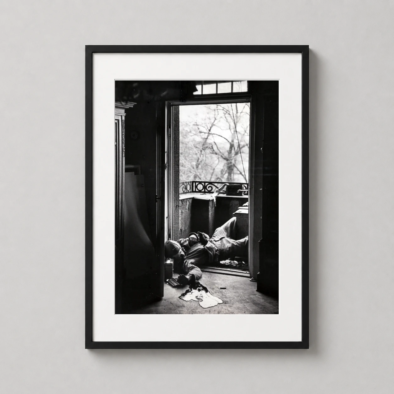Robert Capa — historic black and white photograph by Robert Capa depicting a fallen