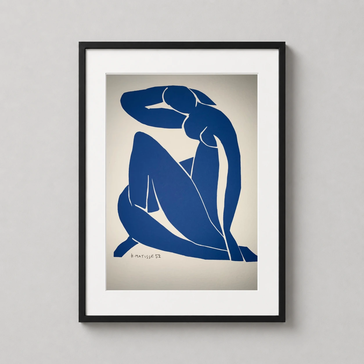 Henri Matisse Blue Nude — bold ultramarine blue silhouette of a seated female figure, captured in