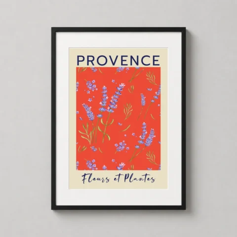 A framed provence lavender wall art print hanging in a bright contemporary dining room with wooden furniture.