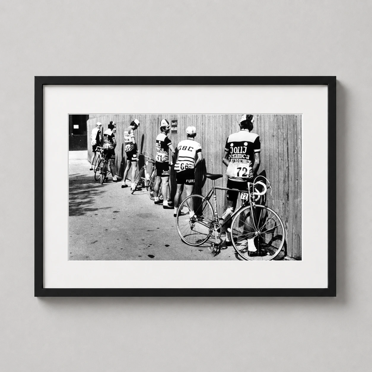 Cyclist Break — candid black and white photography print featuring vintage bicycle