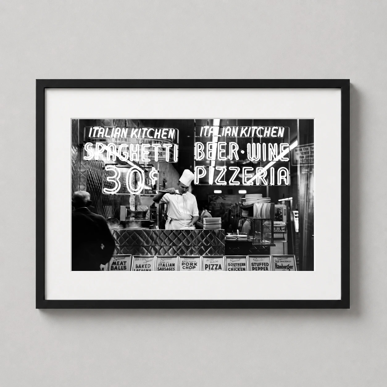 Chef Cooking Spaghetti York Photo — black and white vintage photograph capturing a chef lifting noodles