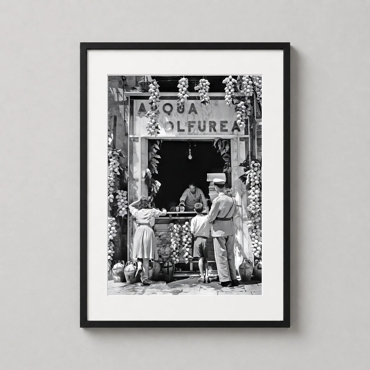 Lemonade Seller — mid-century black and white street photograph of a classic Italian