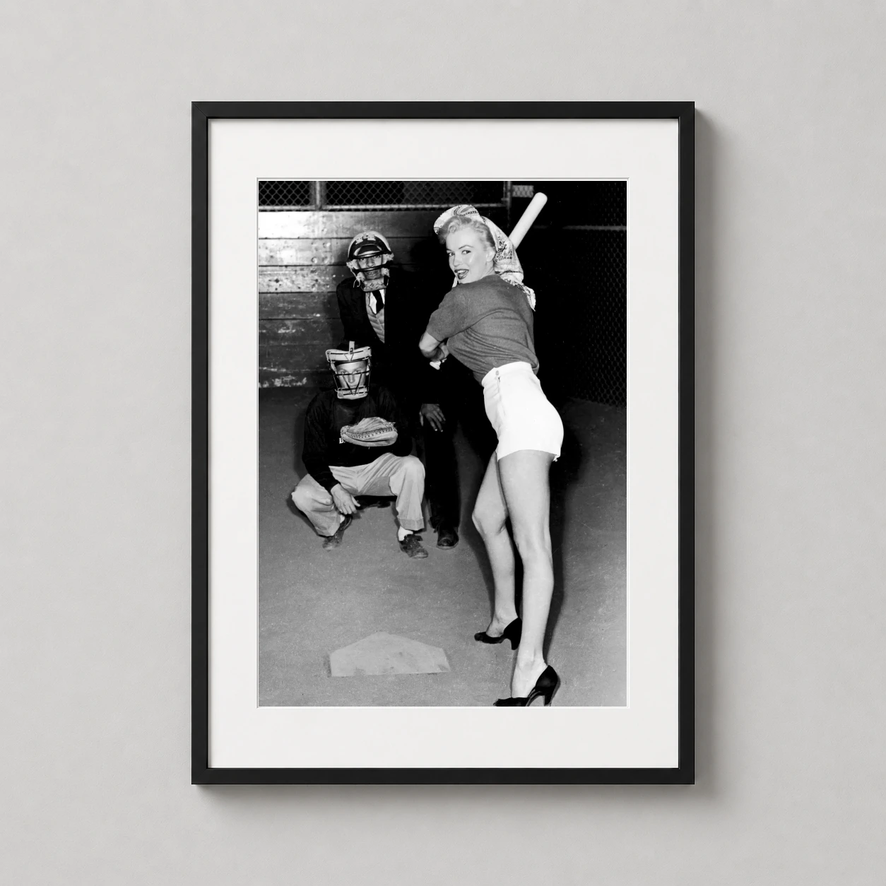 Marilyn Monroe Chicago White — high-contrast black and white photograph of Marilyn Monroe at bat