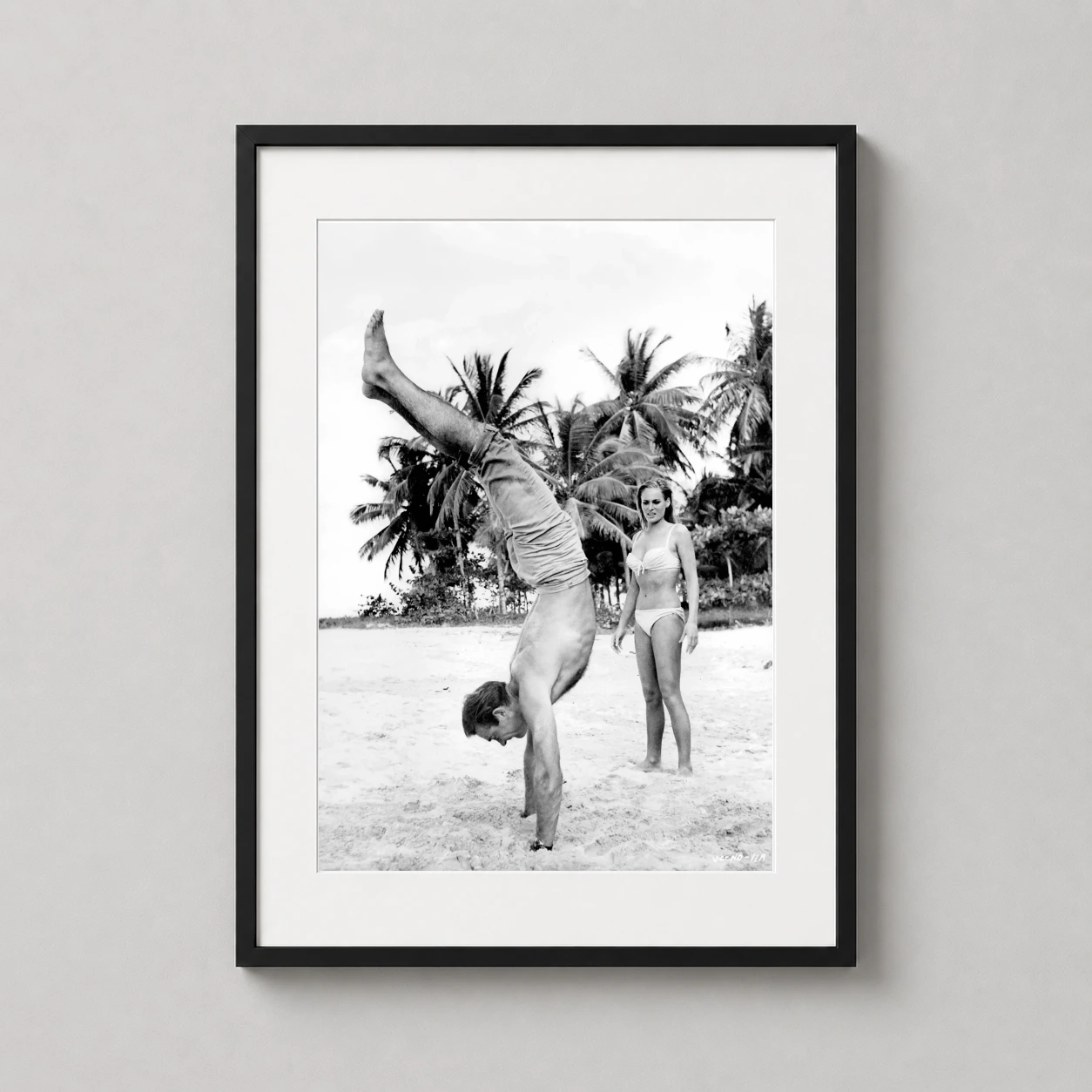 Sean Connery — classic black and white photography of Sean Connery performing a
