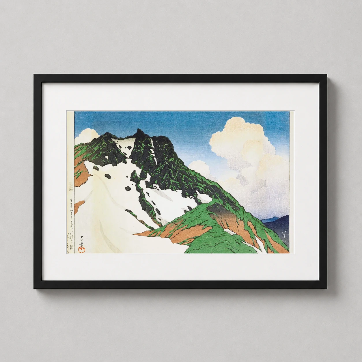 Room mockup of Asahi Peak from Mt Hakuba Kawase Hasui Japanese Art Print, displayed as framed wall art in a bedroom setting as a landscape print with blue tones.