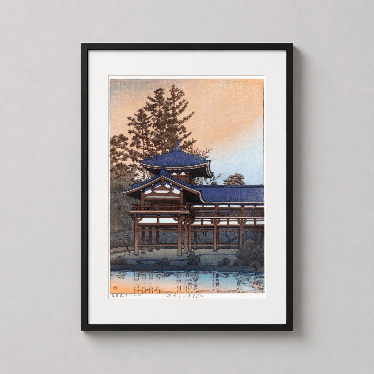 Room mockup of Byodo-in Temple in Uji Renge near Kyoto Kawase Hasui Art Print, displayed as framed wall art in a bedroom setting as a portrait print with blue and yellow tones.