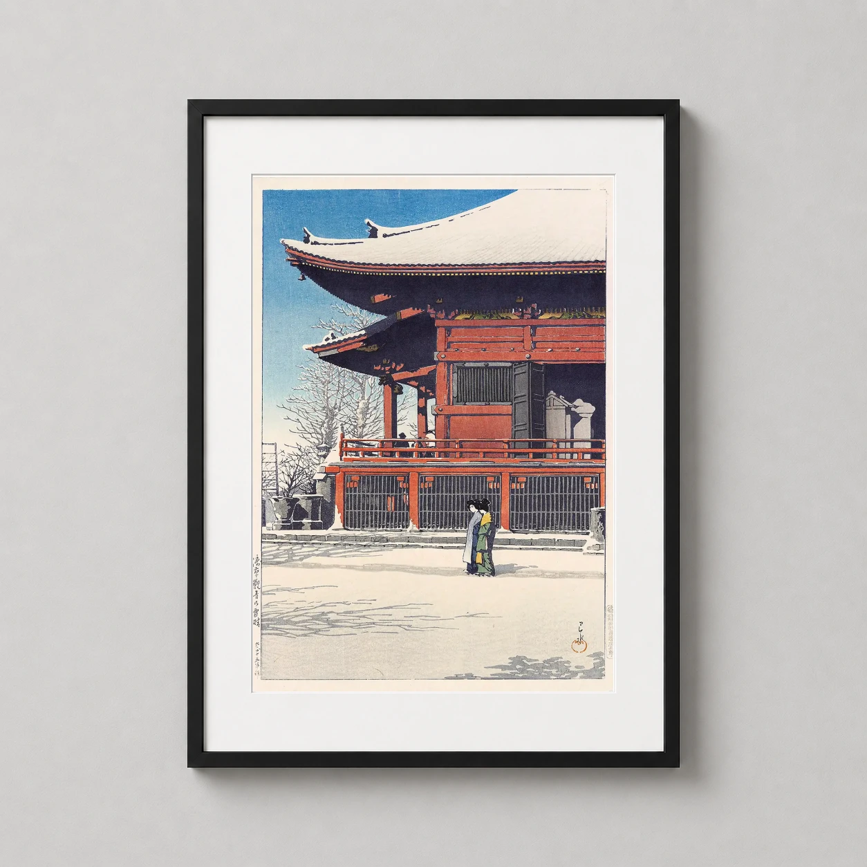 Room mockup of Asakusa Kannon Temple Clearing Sky After Snow Art Print, displayed as framed wall art in a bedroom setting as a portrait print with blue, red, and white tones.