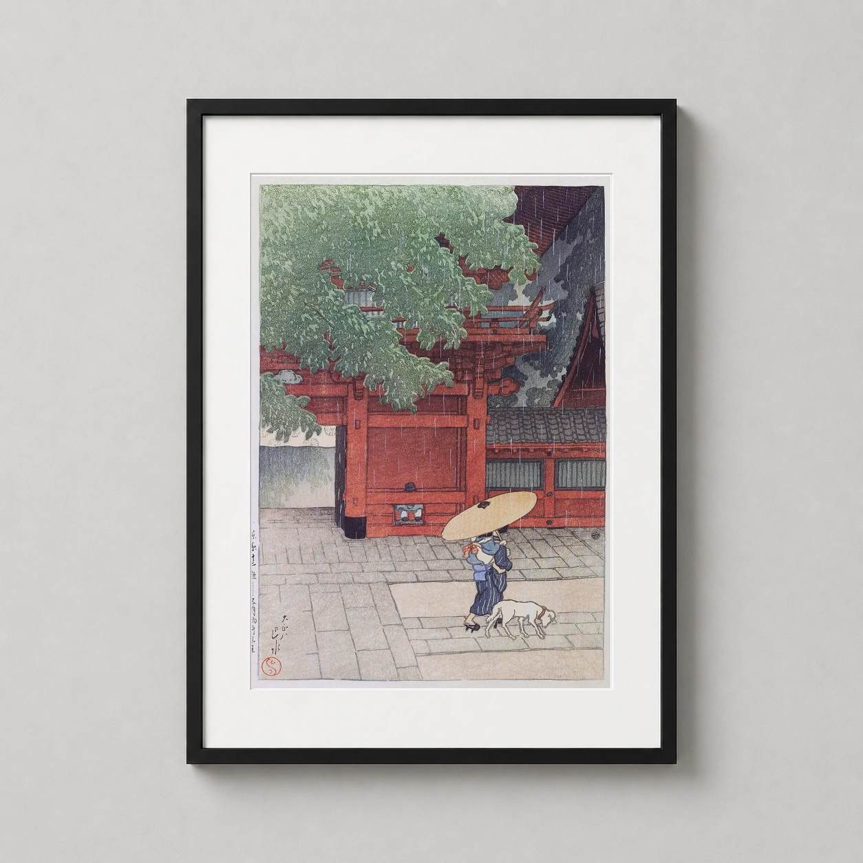 Room mockup of Sanno Shrine Early Summer Rain, Japanese Woodblock Art Print, displayed as framed wall art in a bedroom setting as a portrait print with blue, yellow, and red tones.