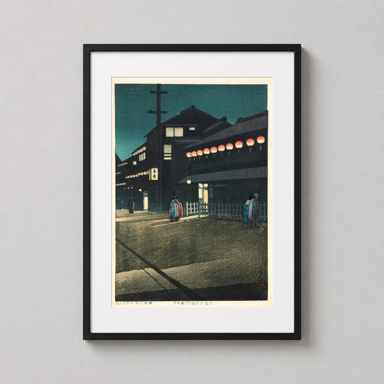 Room mockup of Soemon-cho Osaka by Kawase Hasui, Japanese Woodblock Art Print, displayed as framed wall art in a bedroom setting as a portrait print with teal and red tones.