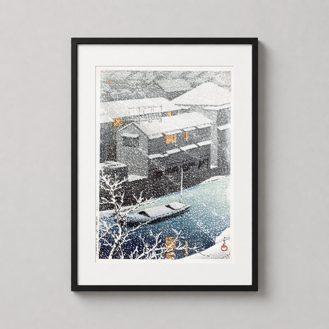Room mockup of Ochanomizu in Snow by Kawase Hasui, Japanese Woodblock Art Print, displayed as framed wall art in a bedroom setting as a portrait print with teal and orange tones.