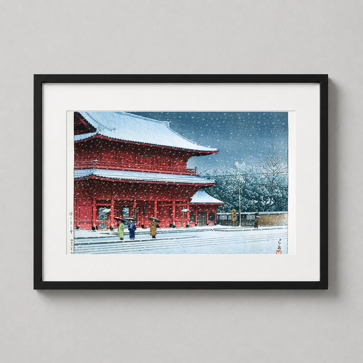 Room mockup of Snow at Zojoji Temple, Kawase Hasui, Japanese Art Print, displayed as framed wall art in a bedroom setting as a landscape print with blue and red tones.