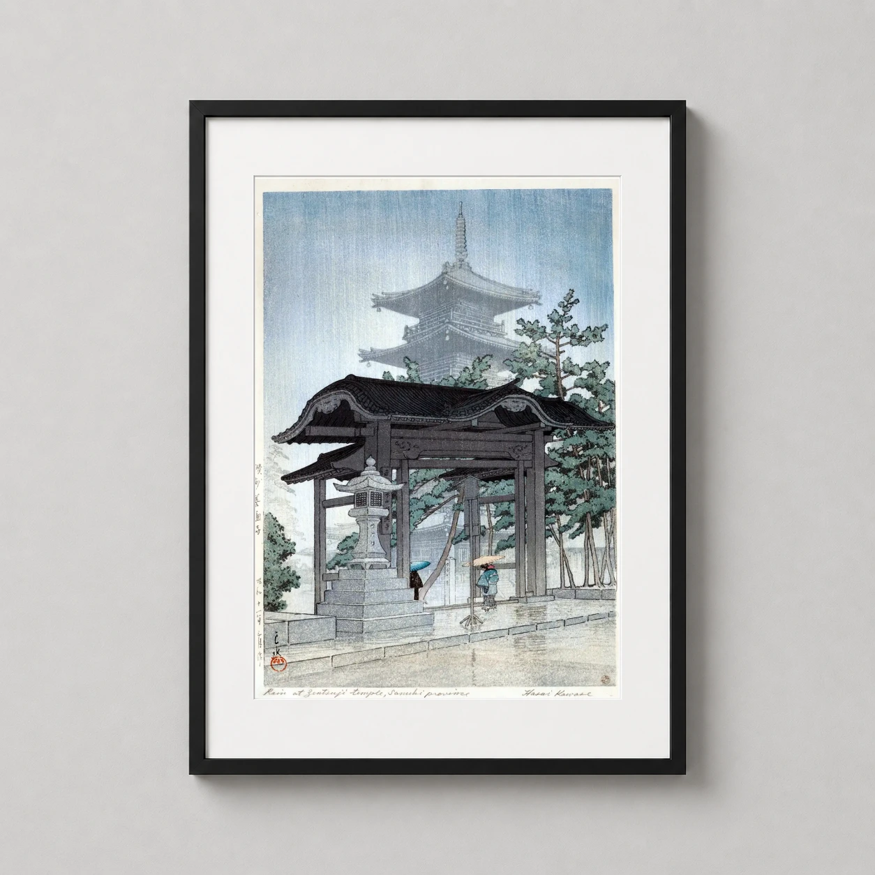 Room mockup of Zentsuji Temple, Sanuki Province by Kawase Hasui, 1937 Art Print, displayed as framed wall art in a bedroom setting as a portrait print with blue tones.
