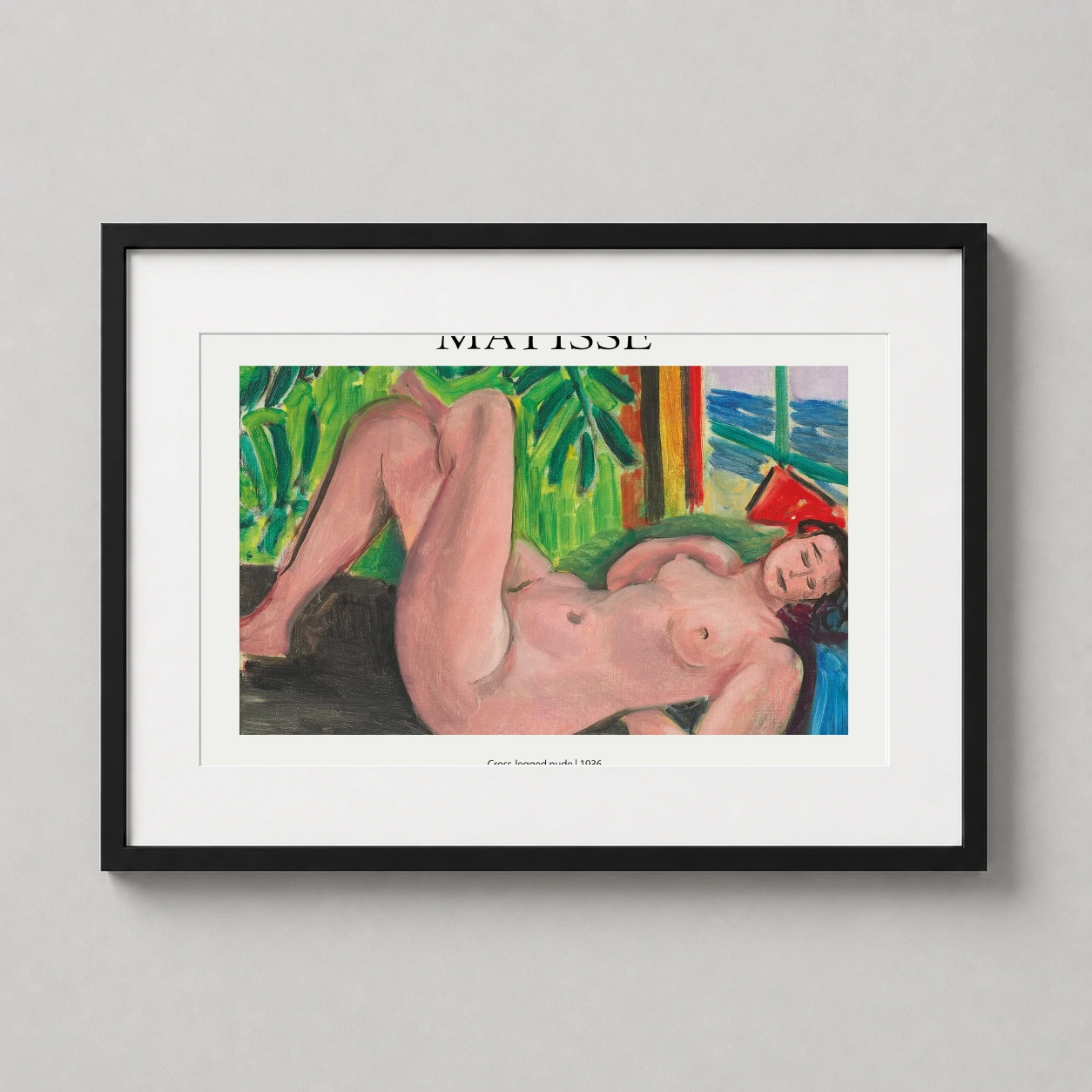 Room mockup of Henri Matisse Cross-legged Nude 1936 Mediterranean Art Print, displayed as framed wall art in a bedroom setting as a landscape print with blue, green, and pink tones.