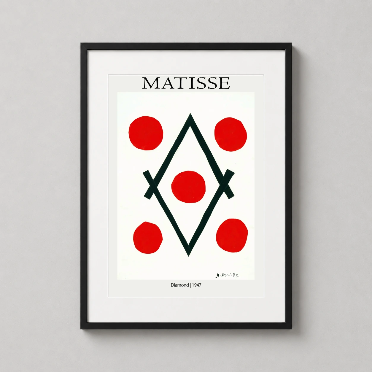 Room mockup of Henri Matisse Diamond 1947 Geometric Abstract Wall Art Print, displayed as framed wall art in a office setting as a portrait print with red, black, and white tones.