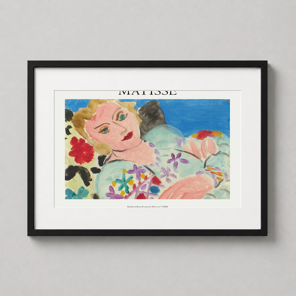 Room mockup of Matisse Embroidered Green Blouse 1936 Exhibition Art Print, displayed as framed wall art in a living room setting as a landscape print with teal, green, and yellow tones.