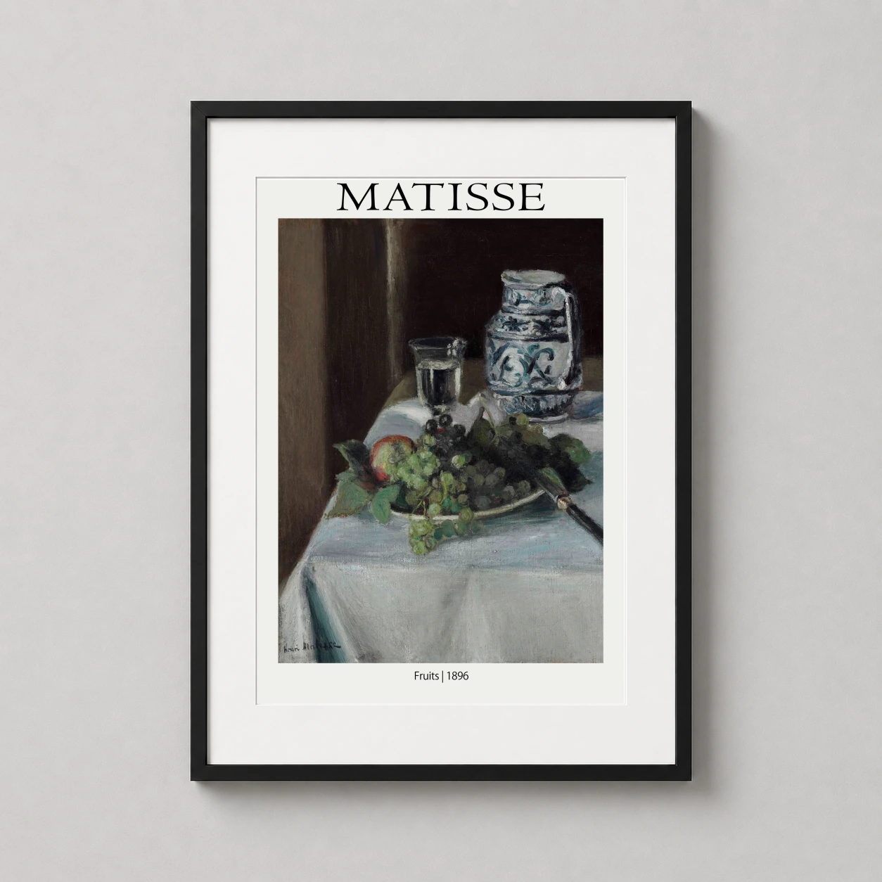 Room mockup of Matisse Fruits 1896 Still Life, French Impressionist Art Print, displayed as framed wall art in a kitchen setting as a portrait print with blue, green, and purple tones.