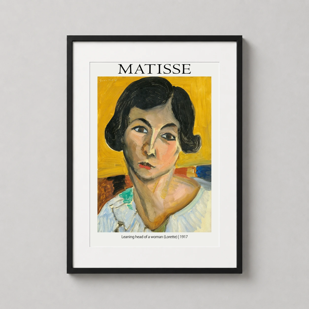 Room mockup of Henri Matisse Leaning Head of a Woman Lorette 1917 Art Print, displayed as framed wall art in a living room setting as a portrait print with yellow tones.