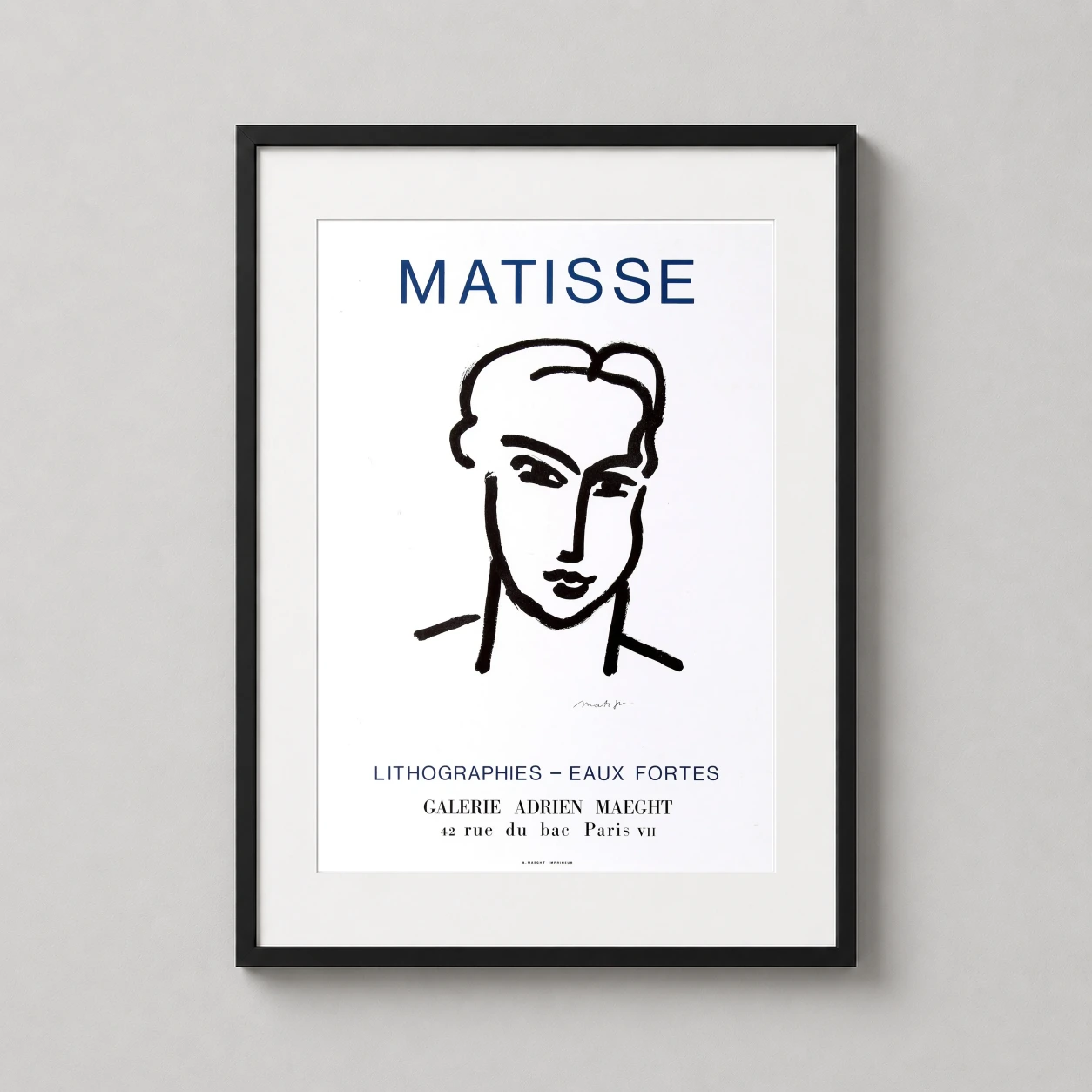 Room mockup of Matisse Galerie Adrien Maeght Exhibition Portrait Wall Art Print, displayed as framed wall art in a living room setting as a portrait print with blue, black, and white tones.