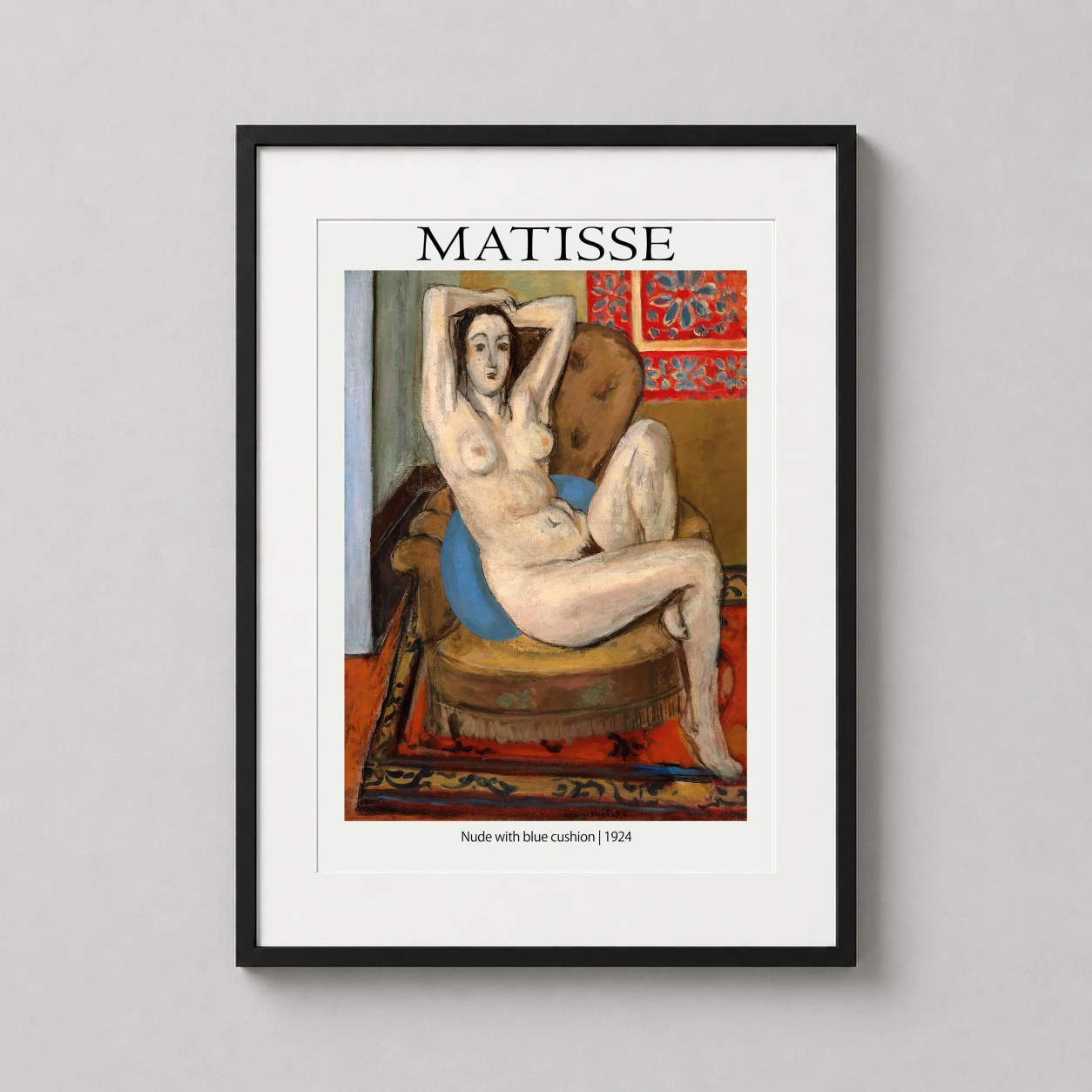 Room mockup of Matisse Nude with Blue Cushion 1924 Exhibition Art Print, displayed as framed wall art in a bedroom setting as a portrait print with blue tones.