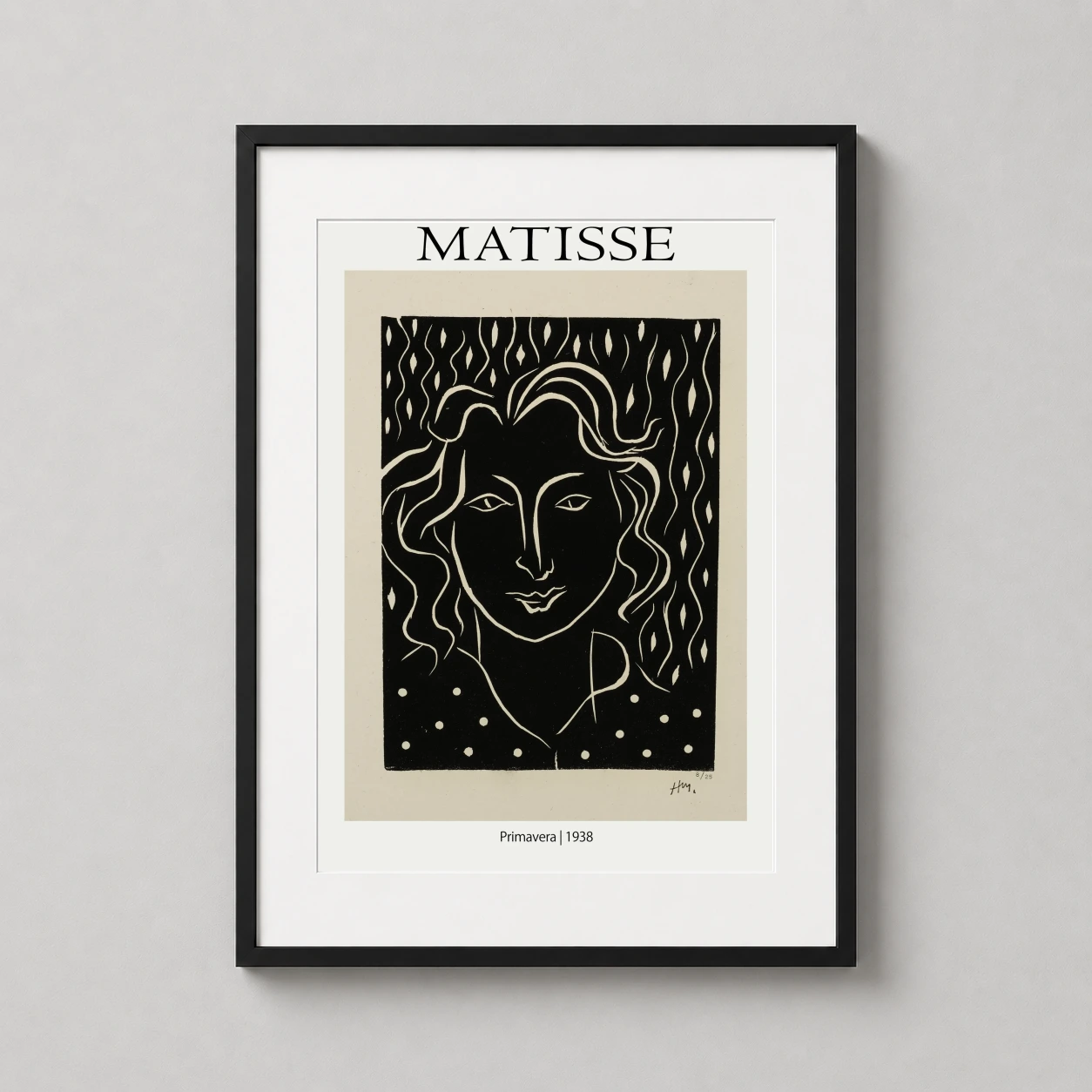 Room mockup of Matisse Primavera 1938 Linocut Portrait, Monochrome Art Print, displayed as framed wall art in a living room setting as a portrait print with black and white tones.