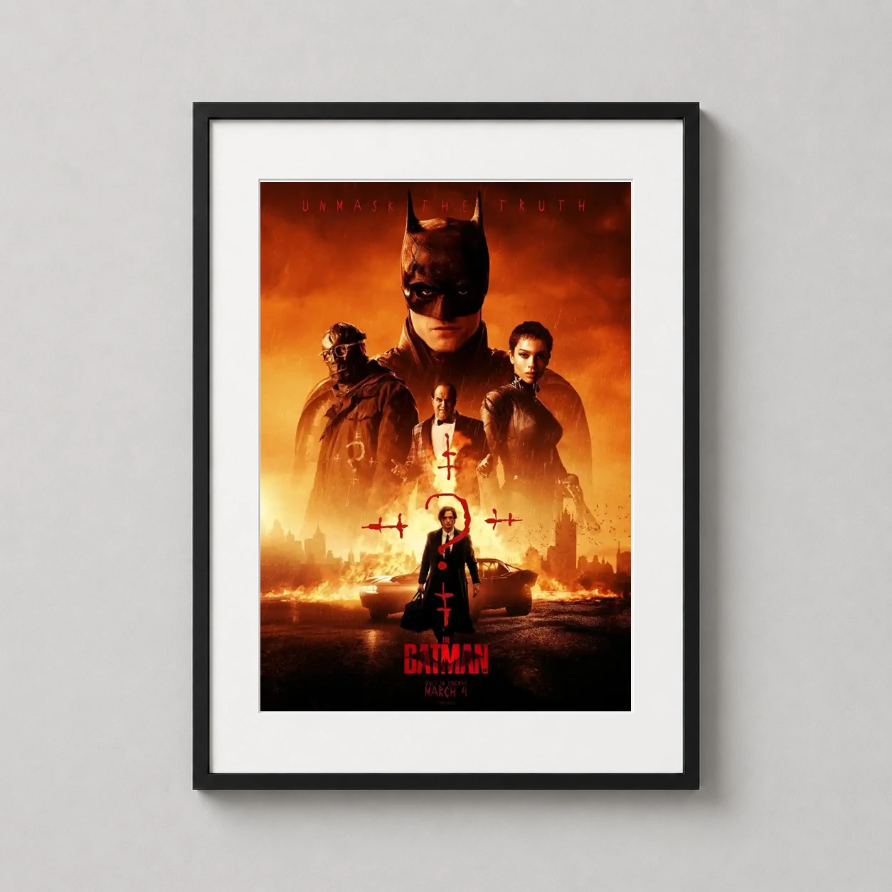Room mockup of The Batman 2022 Cinematic Gotham City Ensemble Movie Poster, displayed as framed wall art in a home theater setting as a portrait print with orange and red tones.