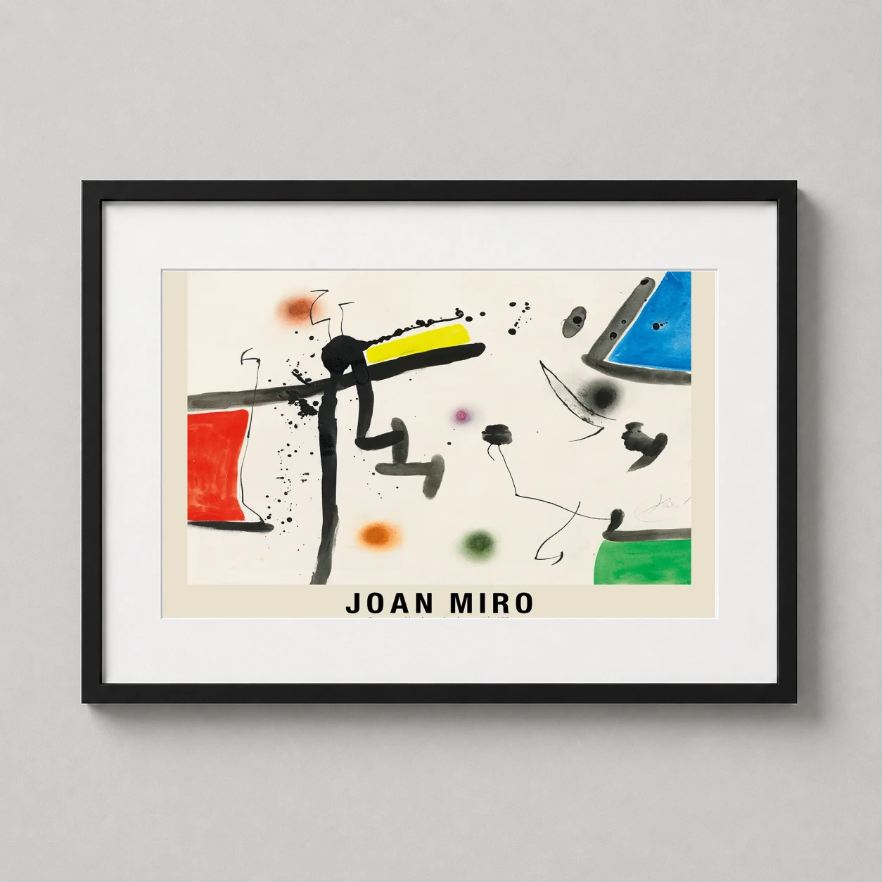 Room mockup of Joan Miro Figure and Birds in a Landscape II 1977 Art Print, displayed as framed wall art in a bedroom setting as a landscape print with green, yellow, and red tones.