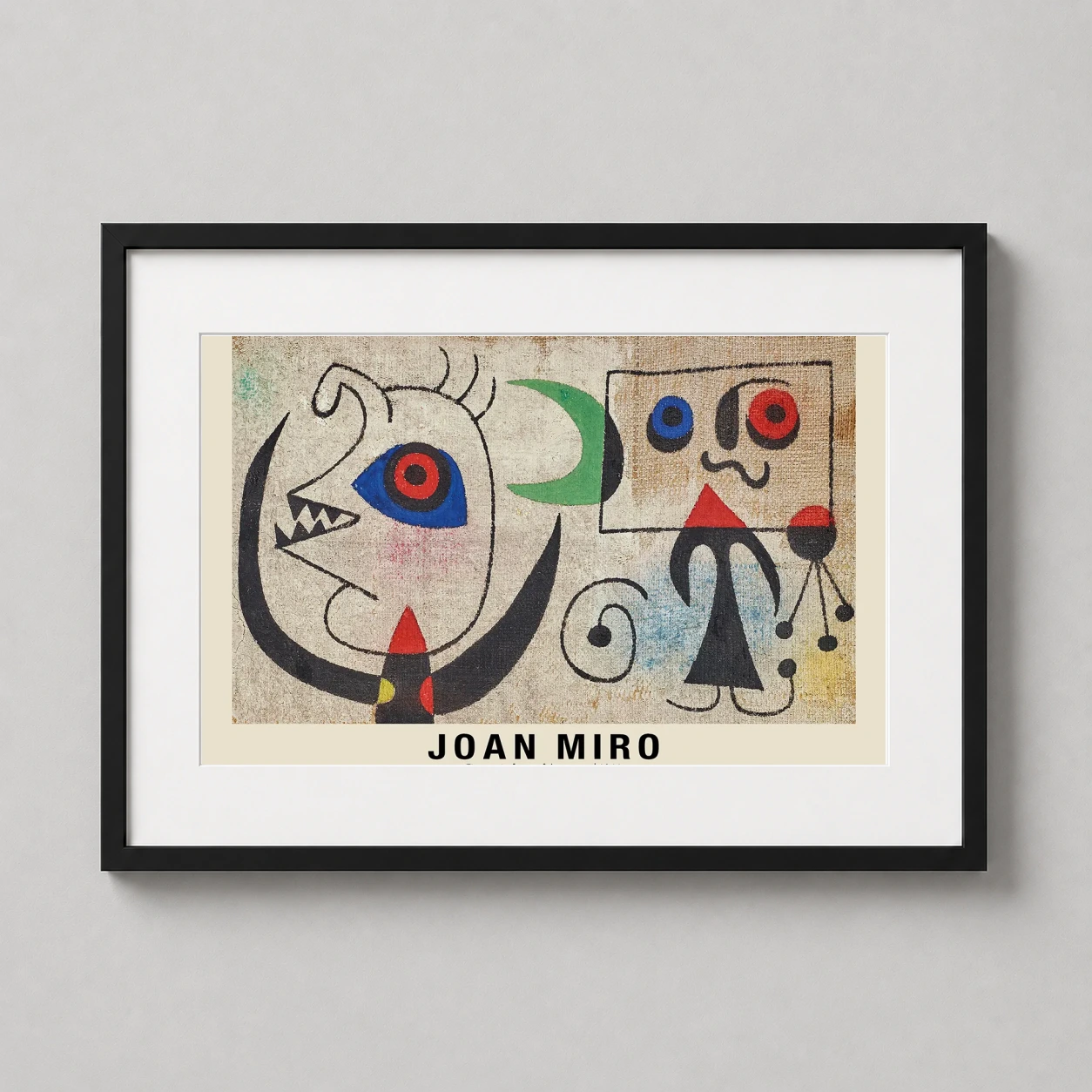 Room mockup of Joan Miro Figures in Front of the Moon 1944 Modern Art Print, displayed as framed wall art in a living room setting as a landscape print with blue, green, and red tones.