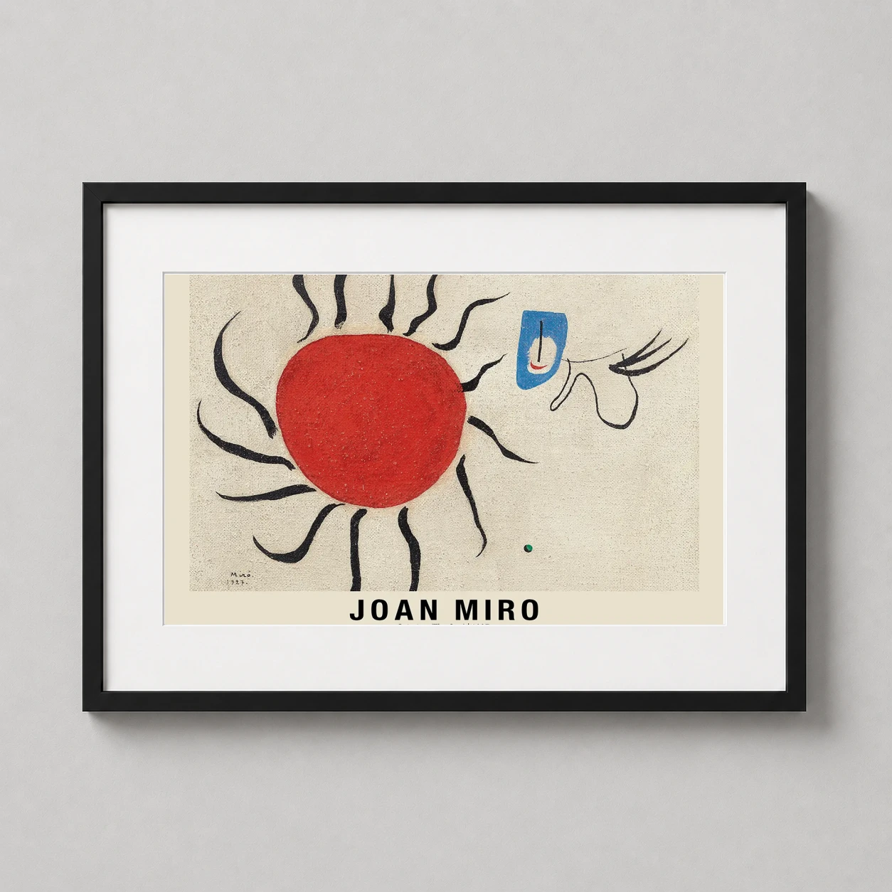 Room mockup of Joan Miro Painting The Sun 1927 Abstract Surrealist Art Print, displayed as framed wall art in a living room setting as a landscape print with blue, green, and red tones.