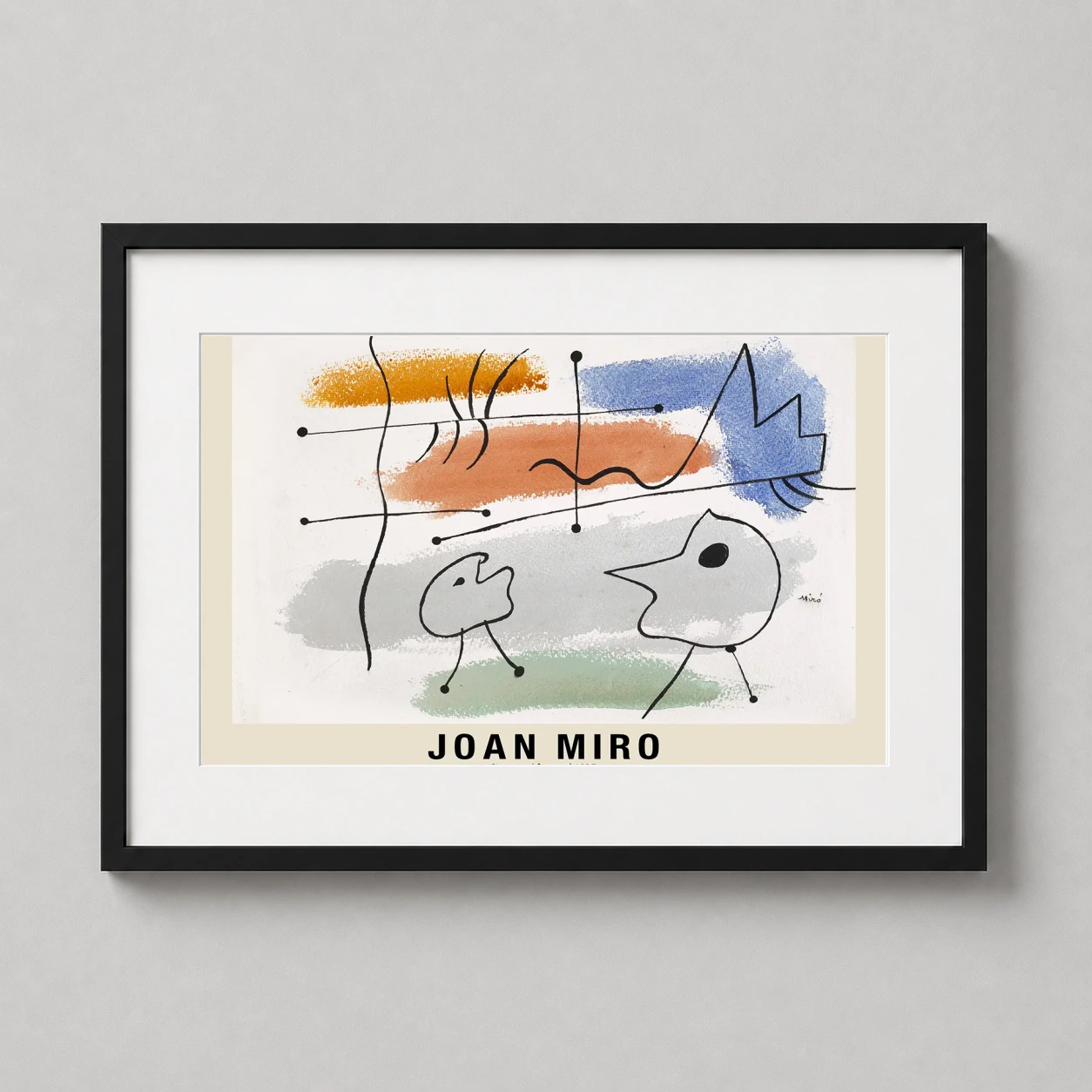 Room mockup of Joan Miró Signs and Figures 1935 Surrealist Abstract Art Print, displayed as framed wall art in a living room setting as a landscape print with blue, green, and orange tones.