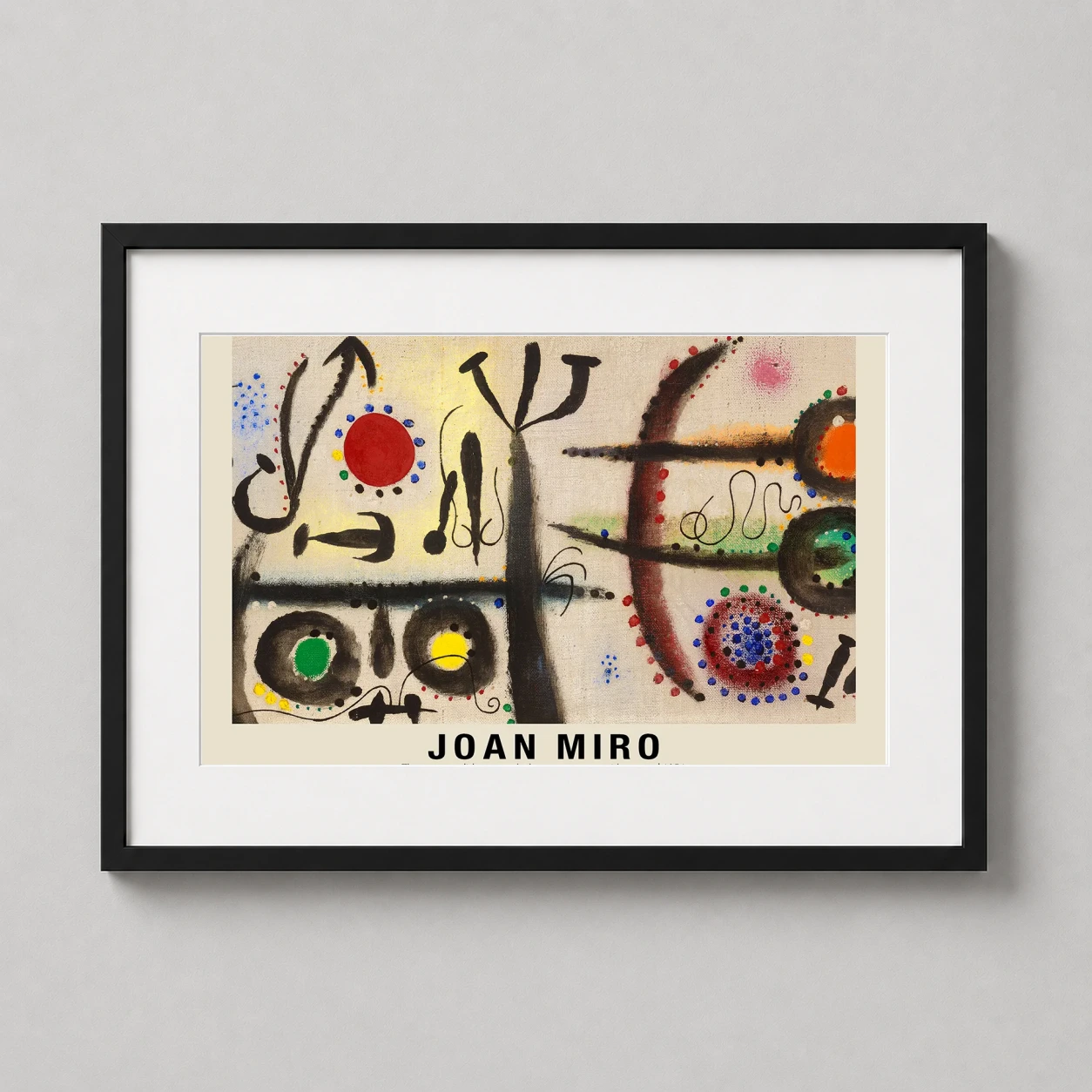 Room mockup of Joan Miro The Serpent Glides Towards the Azure 1954 Art Print, displayed as framed wall art in a living room setting as a landscape print with blue and black tones.