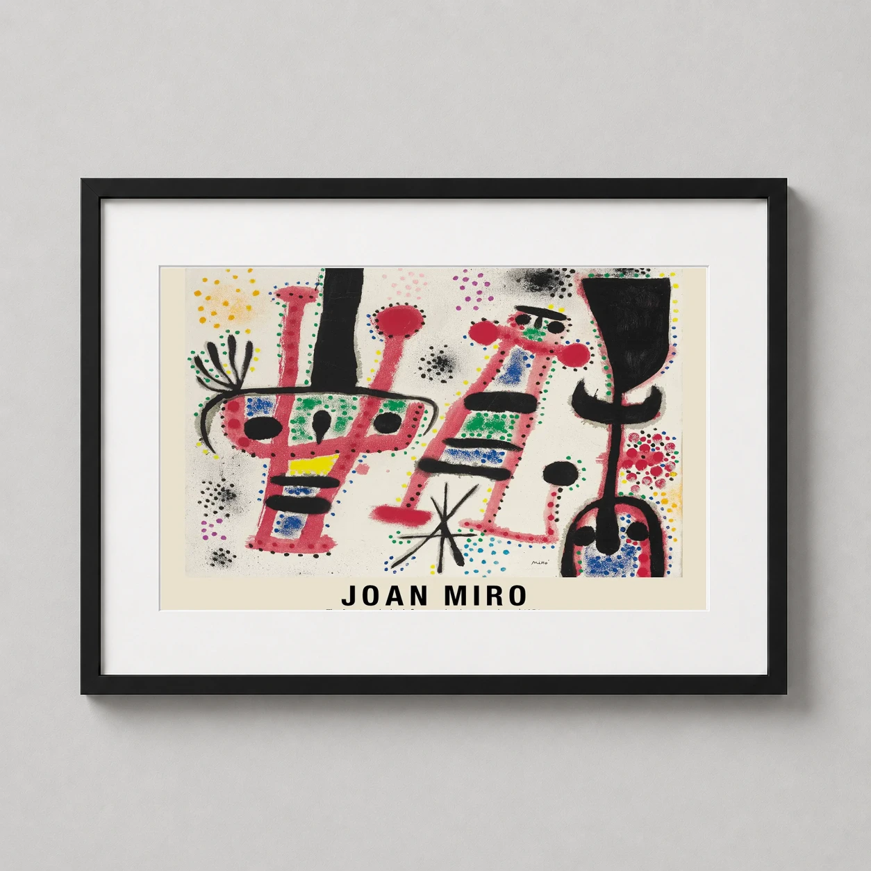 Room mockup of Joan Miró The Star Rises 1954 Abstract Modern Art Print, displayed as framed wall art in a living room setting as a landscape print with red tones.