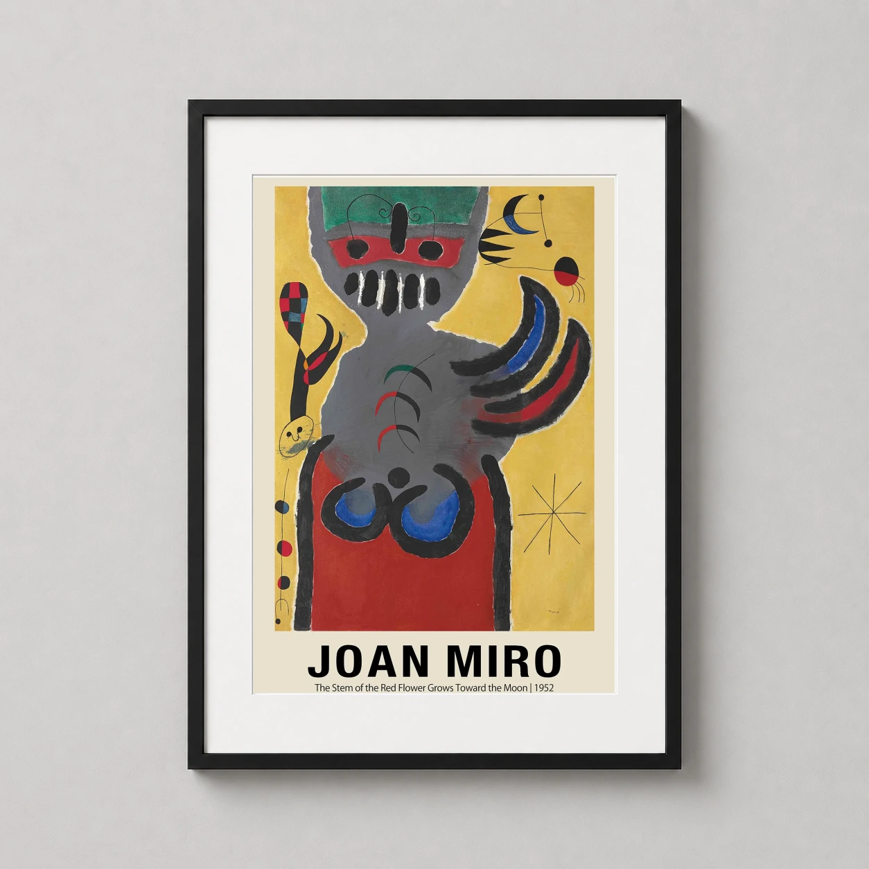 Room mockup of The Stem of the Red Flower Grows Toward the Moon 1952 Art Print, displayed as framed wall art in a bedroom setting as a portrait print with yellow, red, and grey tones.