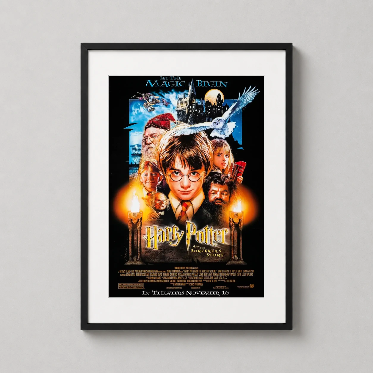 Room mockup of Harry Potter and the Sorcerer's Stone 2001 Theatrical Movie Poster, displayed as framed wall art in a home theater setting as a portrait print with orange tones.