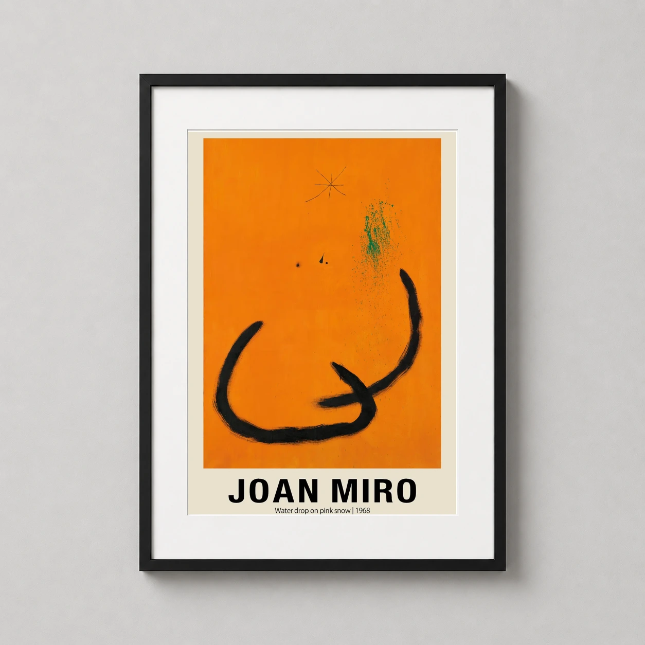 Room mockup of Joan Miro Water Drop on Pink Snow 1968 Abstract Art Print, displayed as framed wall art in a living room setting as a portrait print with green, orange, and pink tones.