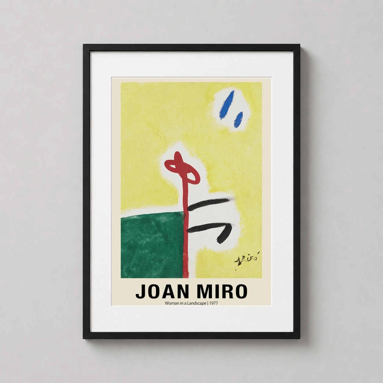 Room mockup of Joan Miro Woman in a Landscape 1977 Abstract Art Print, displayed as framed wall art in a living room setting as a portrait print with blue, green, and yellow tones.
