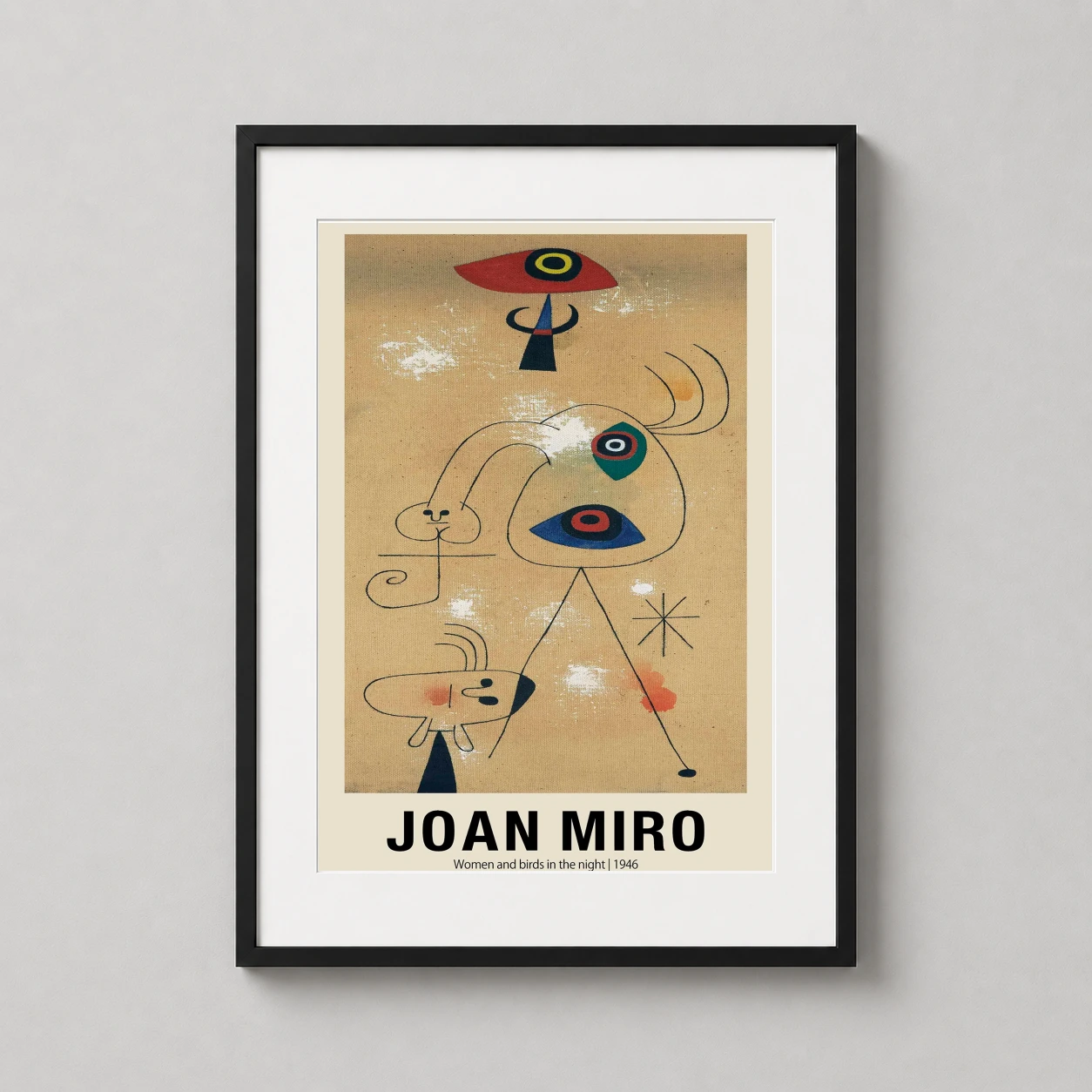 Room mockup of Joan Miro Women and Birds in the Night 1946 Modern Art Print, displayed as framed wall art in a bedroom setting as a portrait print with blue, red, and black tones.